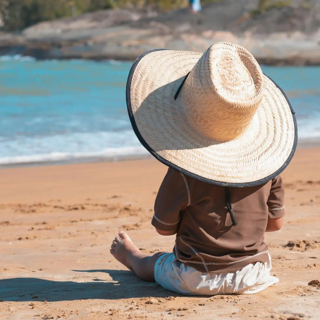 Criança na praia
